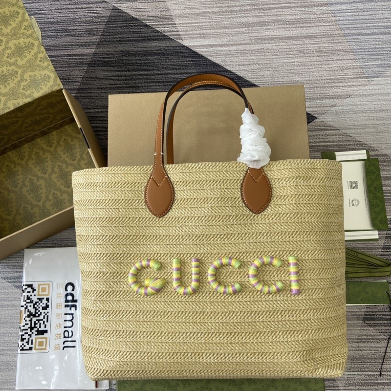 G*u*i shopping bags